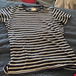 dark blue, white and a little yellow crew tee